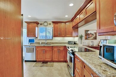 SS appliances, granite counter top, wood cabinets 