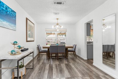 The formal living area seamlessly flows into the e