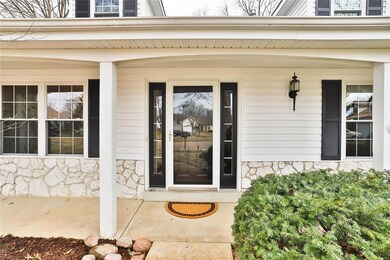 Charming curb appeal with covered front porch