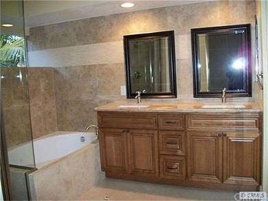totally remodeled master bathroom with travertine 