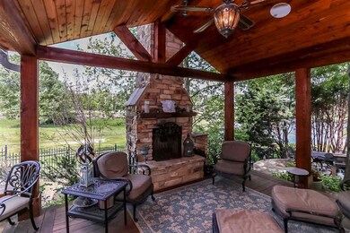 Relax outside in the iron fenced backyard with an 