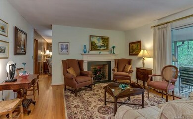 Living Room leads to the Den which is also off the