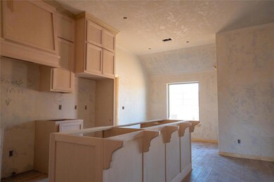 Kitchen with vaulted ceiling