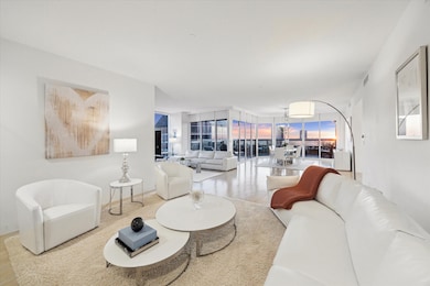 From the cozy formal living room, the view extends