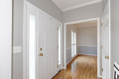Rich hardwood floors throughout.