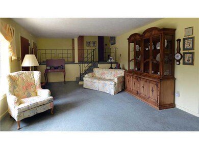 Living Room. Notice the balcony at the far end of 