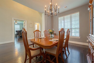 Upon entering, a spacious formal dining room with a large window greets you on the left.