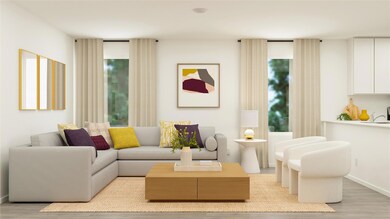 Living area with light wood finished floors and ba