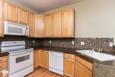 Kitchen w/Granite Counters & Back Splash
