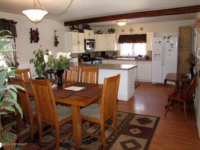 Laminate floor in kitchen & dining room.