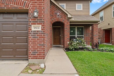 Charming two-story brick home with a welcoming fro