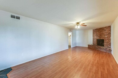 Large family room with brick fireplace