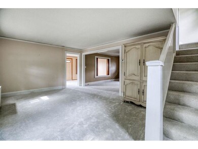 Step from the 4-season porch into the living room.