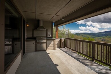 Covered deck with built-in grill and incredible mo