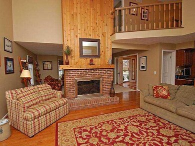Family Room The cozy double-sided woodburning fire