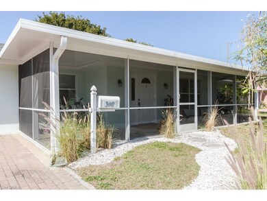 Front entry with 6' X 30' screened porch and sitti