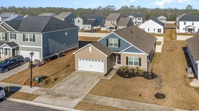 Birds eye view of property with a residential view