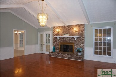 Family Room with Cathedral Ceiling, Fireplace and 