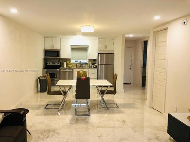 Large living room and dining room with open kitchen, everything is completely remodeled.