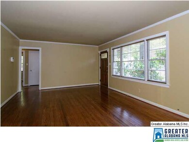 Living room has fresh paint, beautiful hardwood fl