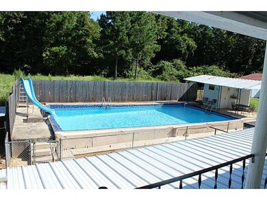 Pool. VIEW OF POOL FROM UPSTAIRS BALCONY