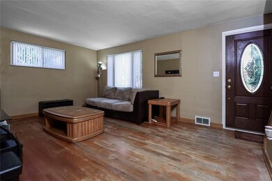 Living Room: Spacious living room with newer windo