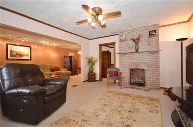 Living Room with brick gas log fireplace