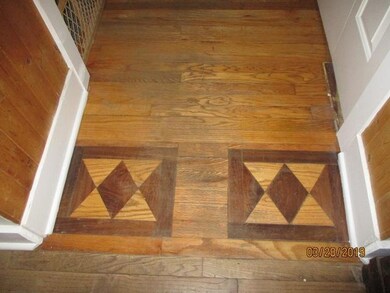Wood floor w/wood inlay