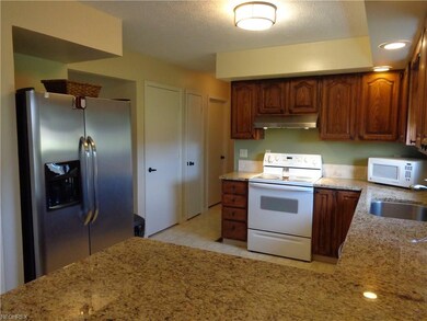View #2 of the kitchen w/granite counter tops, ran