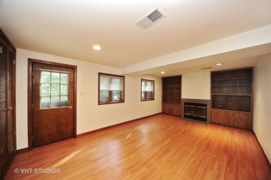 Super Family Room with a Fireplace and shelving on