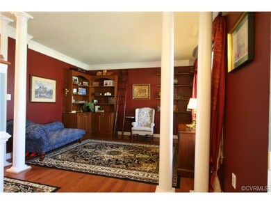 Living Room has 2 windows overlooking front yard. 