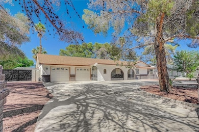 View of front of property with an attached garage,