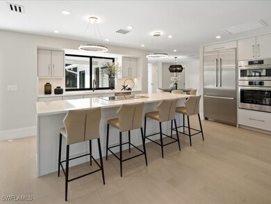 518 Cypress Way E, Naples, FL 34110 - photo 2