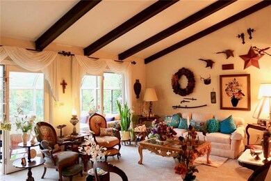 Sunken Living Room with wood bean ceiling, custom 