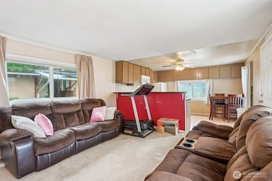 open concept living room with kitchen
