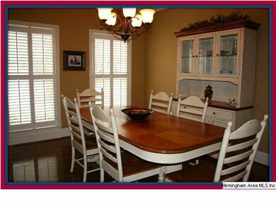 Large roomy dining room on the front of the house!