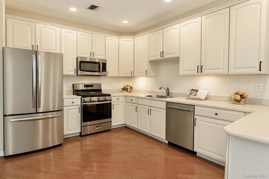 445 Bardini Dr unit 445, Melville, NY 11747 - photo 2