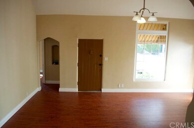 Front entrance to living room with chimney