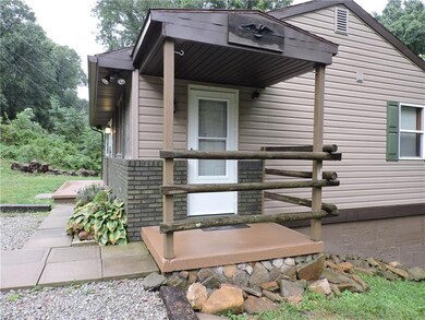 The Welcoming Porch Opens into the Kitchen.  The R