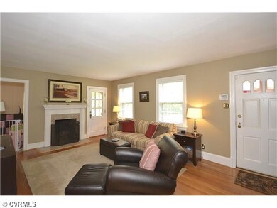 Living Room - The living room has hardwood floors,