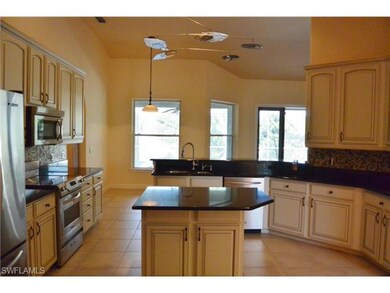 SPACIOUS KITCHEN WITH GRANITE AND CENTER ISLAND; S