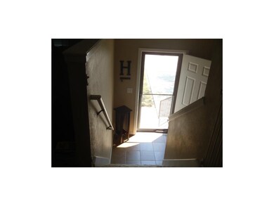 TILED ENTRYWAY  NEW STORM DOOR