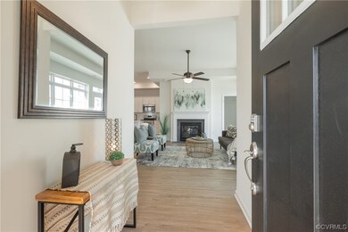 Entrance foyer featuring light laminate flooring a