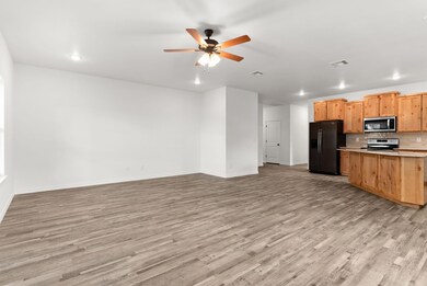 Kitchen featuring visible vents, appliances with 