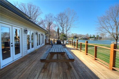 Large deck area extends along the house