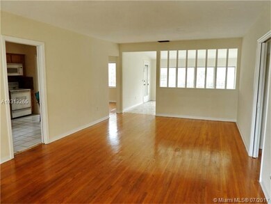 Living room/Fl Room looking in to kitchen and dini