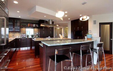 Two kitchen islands including bar