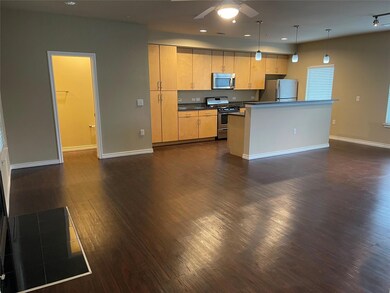Kitchen featuring appliances with stainless steel
