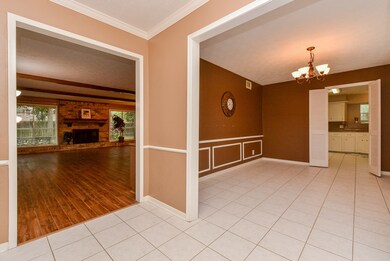 The entryway leads to the dining room on the right