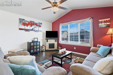 Living room featuring dark hardwood / wood-style f